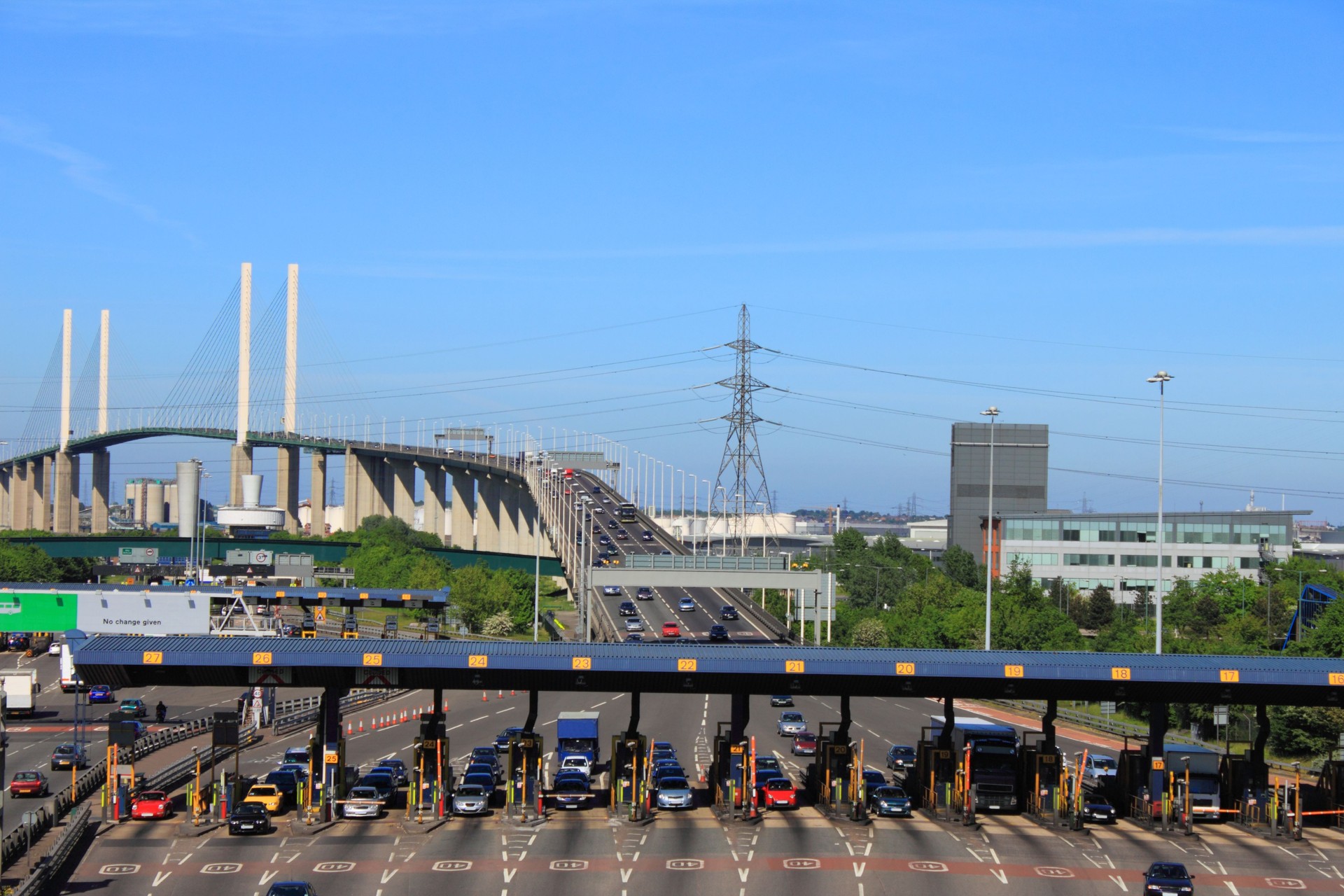 toll plaza with booths on motorway bridge